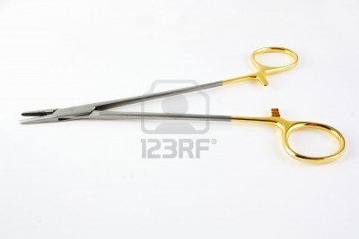 6505006-surgical-medical-clamp-with-golden-handle-over-white-background.jpg