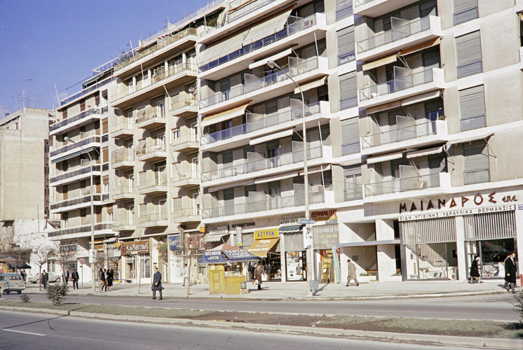 Greece, apartment buildings with street level retail in Athens.jpg
