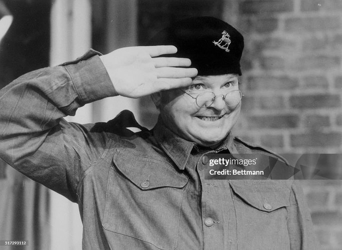 comedian-benny-hill-saluting-in-his-television-show.jpg
