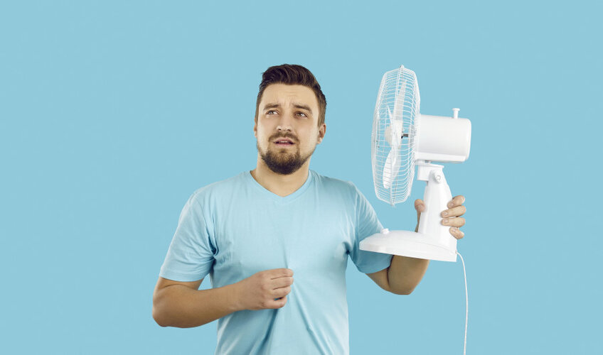 bigstock-Man-Suffers-From-Summer-Heat-454004129.jpg