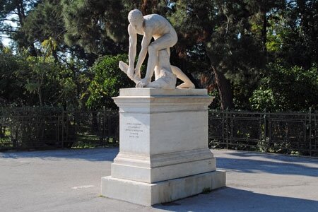 2steps_gr_statue_marble_breaker_wood_man_xylothrafstis_filippotis_-zappeion_athens_attica_001.jpg